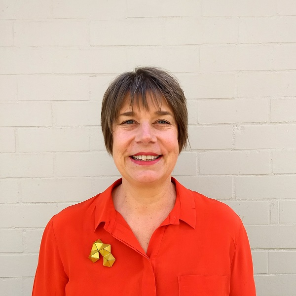 smiling woman wearing business suit